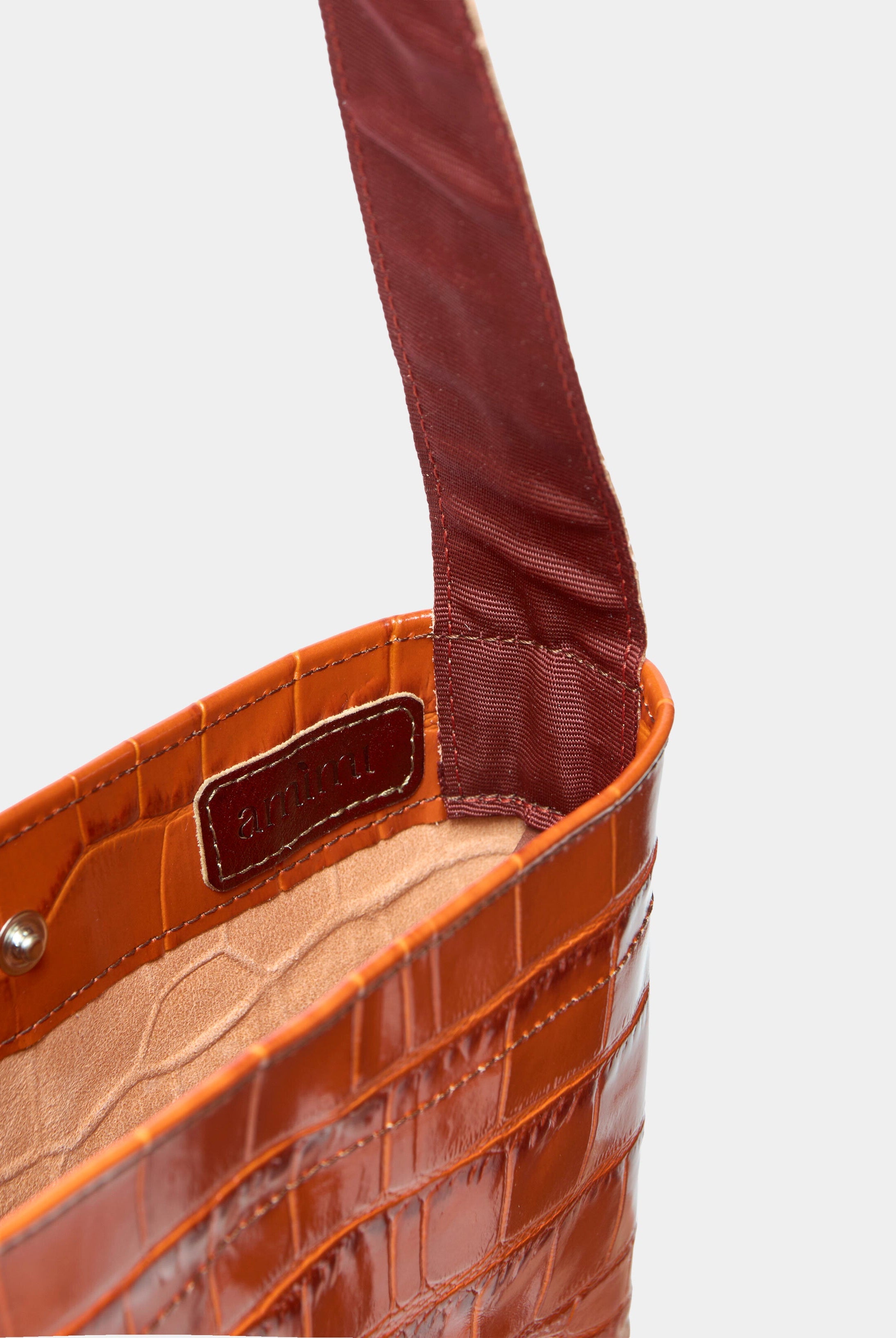 Lea Bag Cocco Orange dettaglio interno fodera beige e logo Amimi
