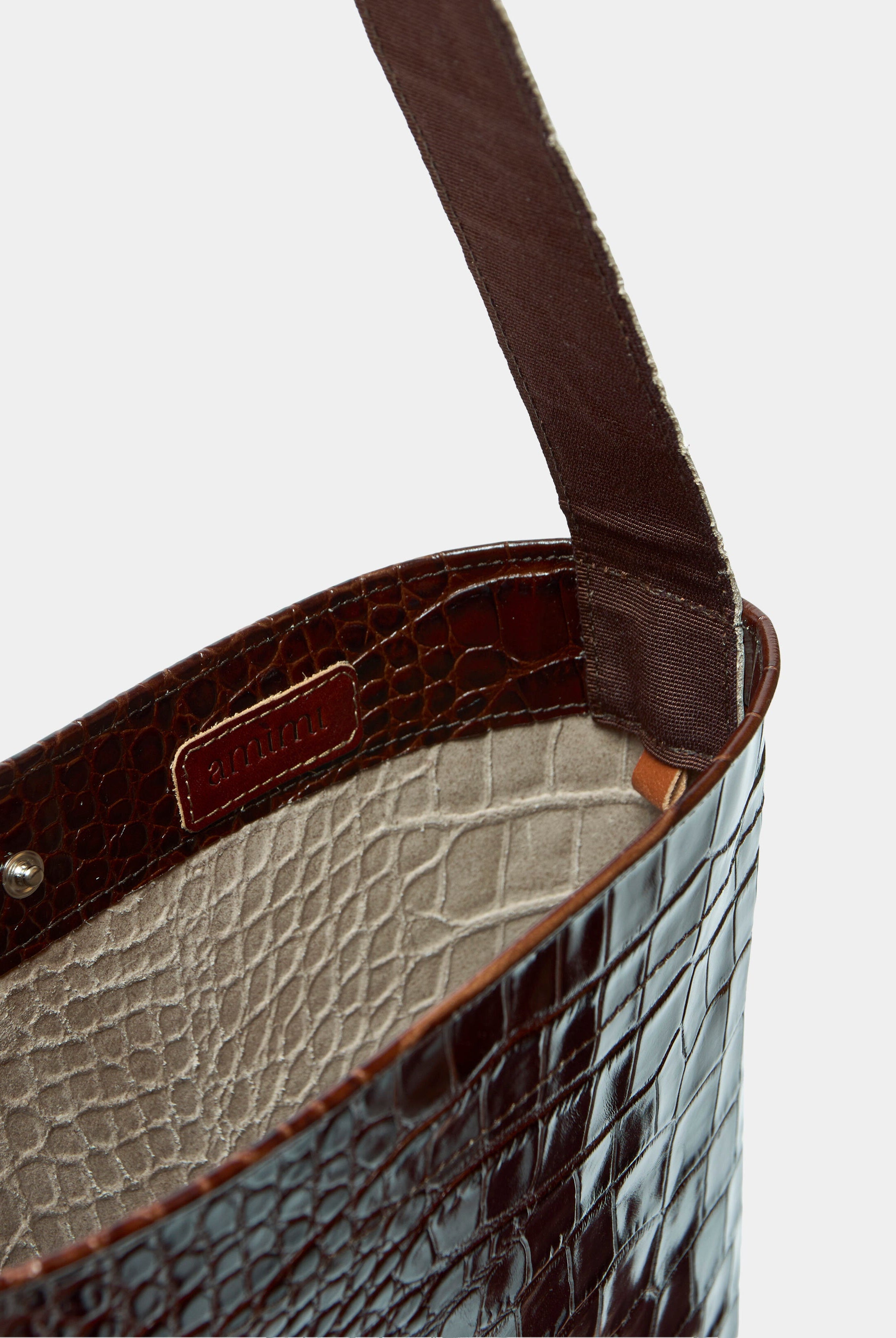 Lea Bag Maxi Cocco Chocolate dettaglio interno fodera e clip in pelle stampa cocco Amimi Milano